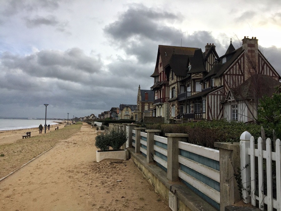 Norman coast in winter after the storm. The sand everywhere .
