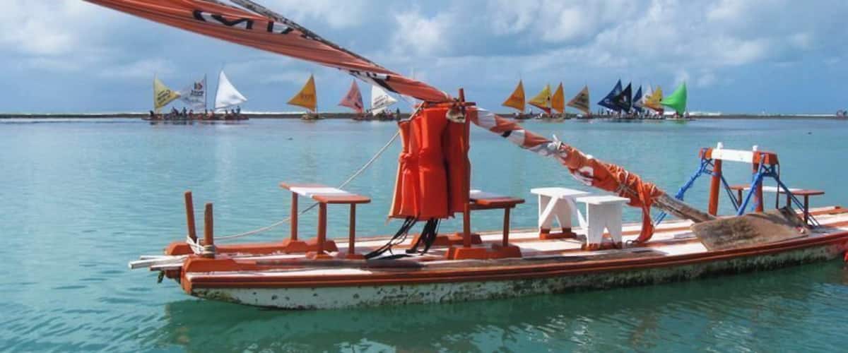 Jangadas are the traditional and most popular way to visit the tide pools in Porto de Galinhas. #beachtips #waterlust