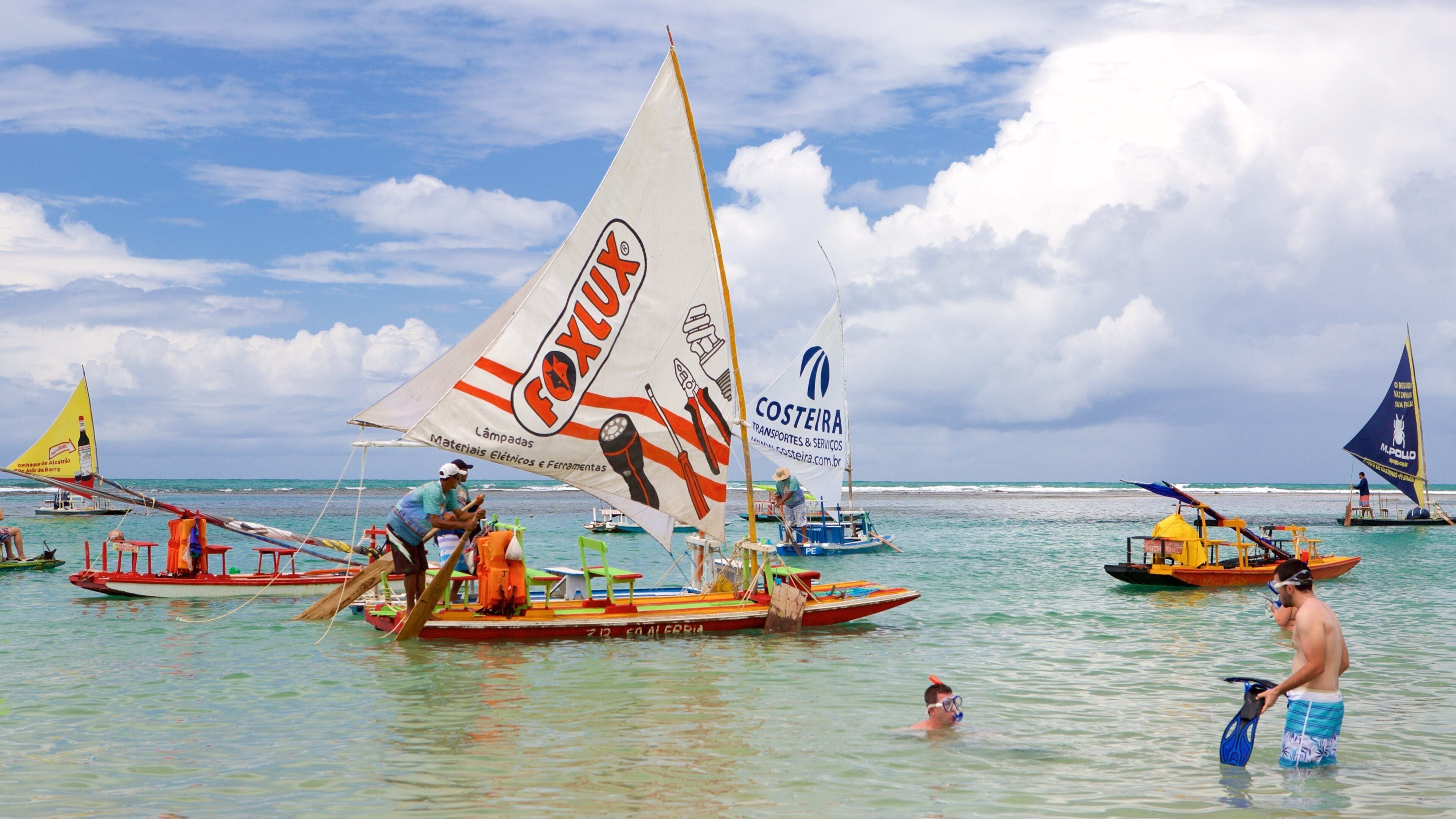 Porto de Galinhas which includes general coastal views, sailing and swimming