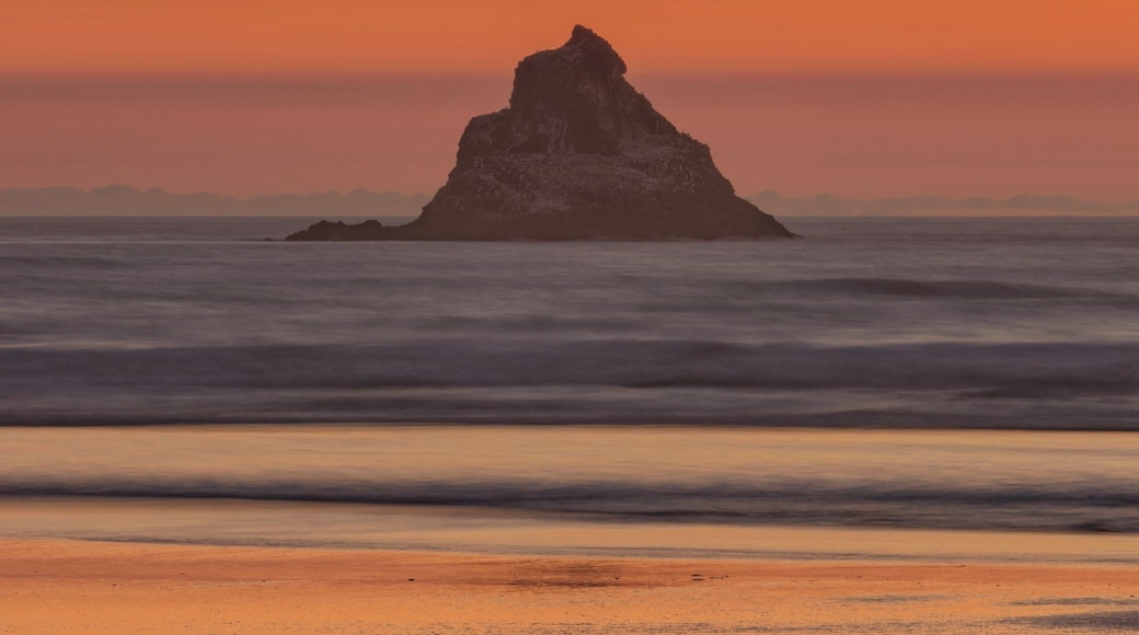 These rock outcroppings are scattered all over the coast. For sunset just sit back and enjoy the view.