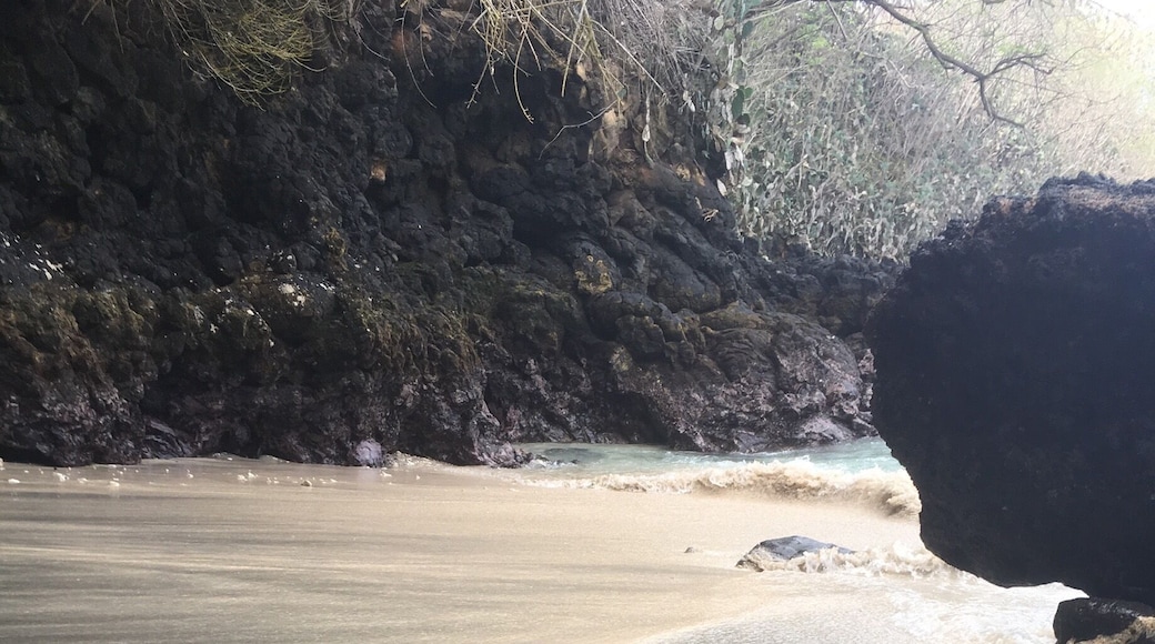 A little beach with a mix of black and white sand
Be careful because there is a strong current