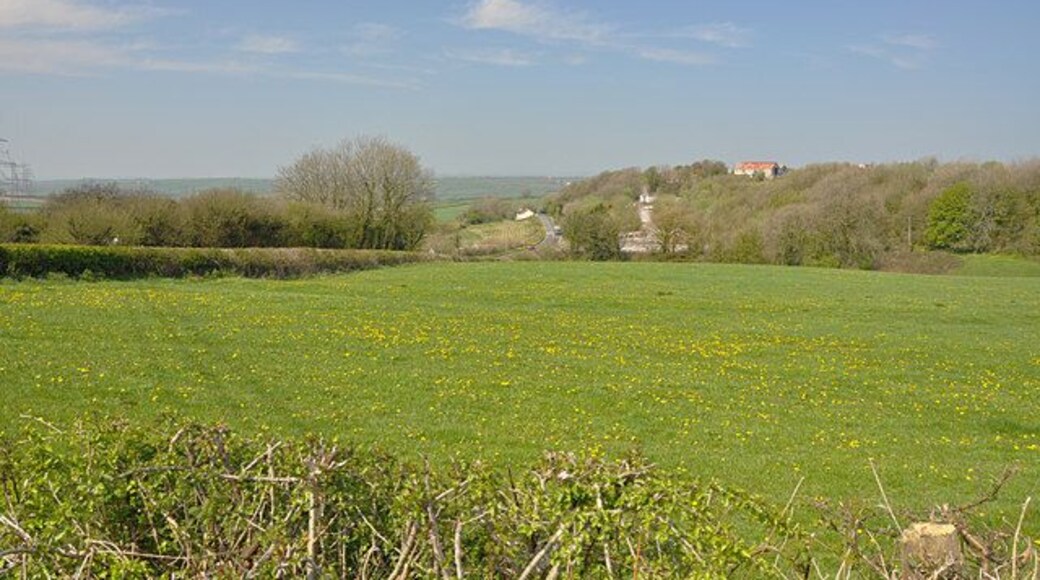 View along the line of the B4309 north of Meinciau Buildings associated with the nearby quarry can be seen to the right.