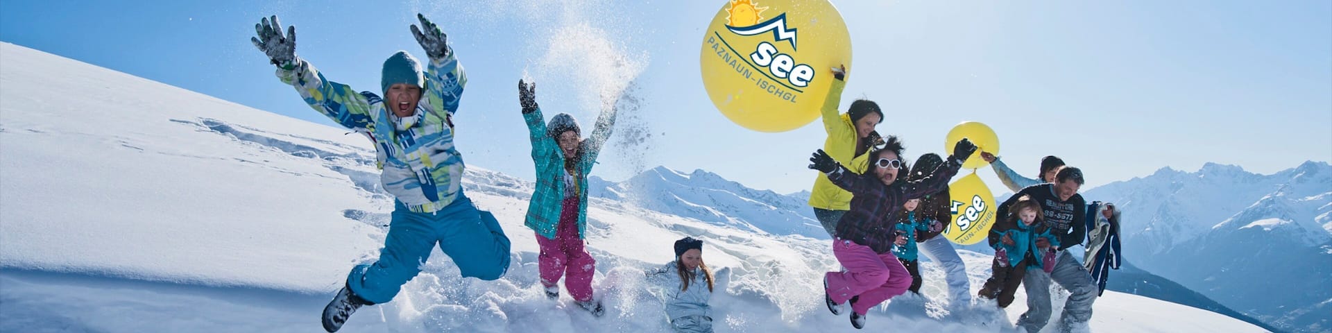 See showing snow as well as a large group of people