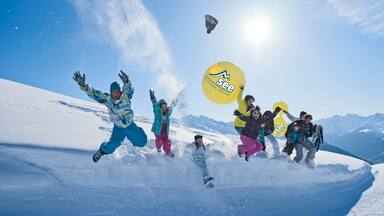 See showing snow as well as a large group of people