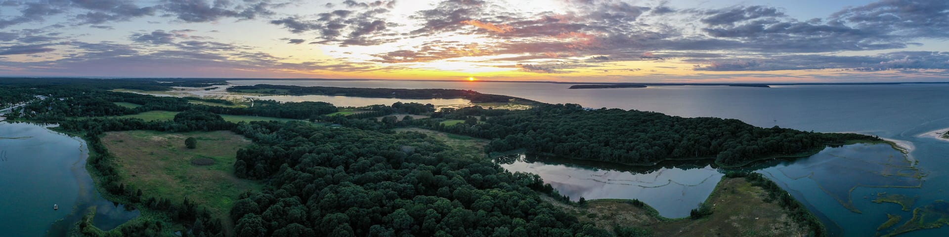Sunset along the beach at Towd Point in Southampton, Long Island, New York.