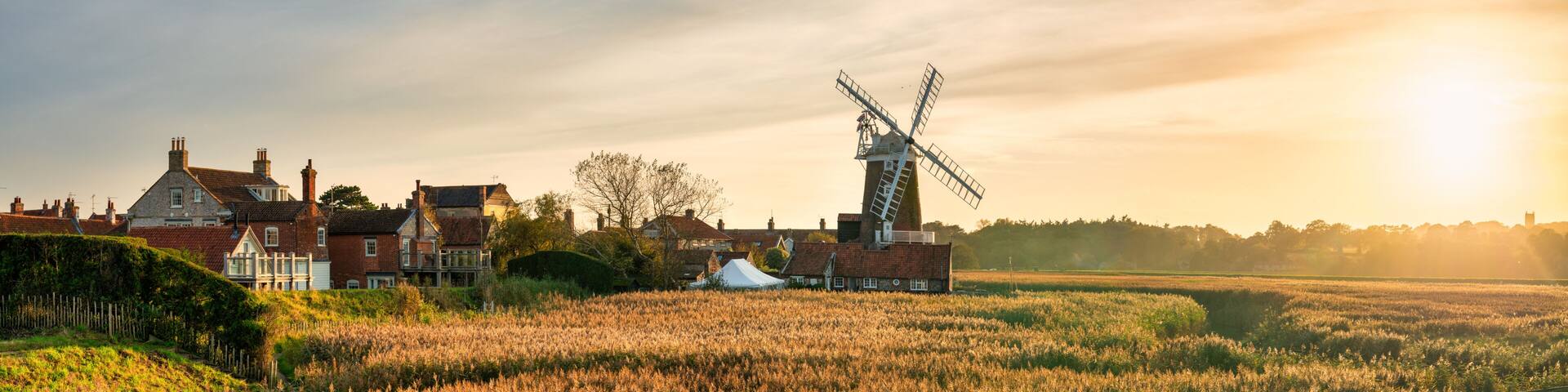 Cley Windmill at sunset in the village of Cley, Norfolk, UK