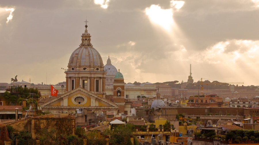 Beautiful sunset over Rome capturing the majesty of historic architecture near Spanish Steps