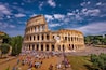 Tourists Visiting The Colosseum in Rome Italy