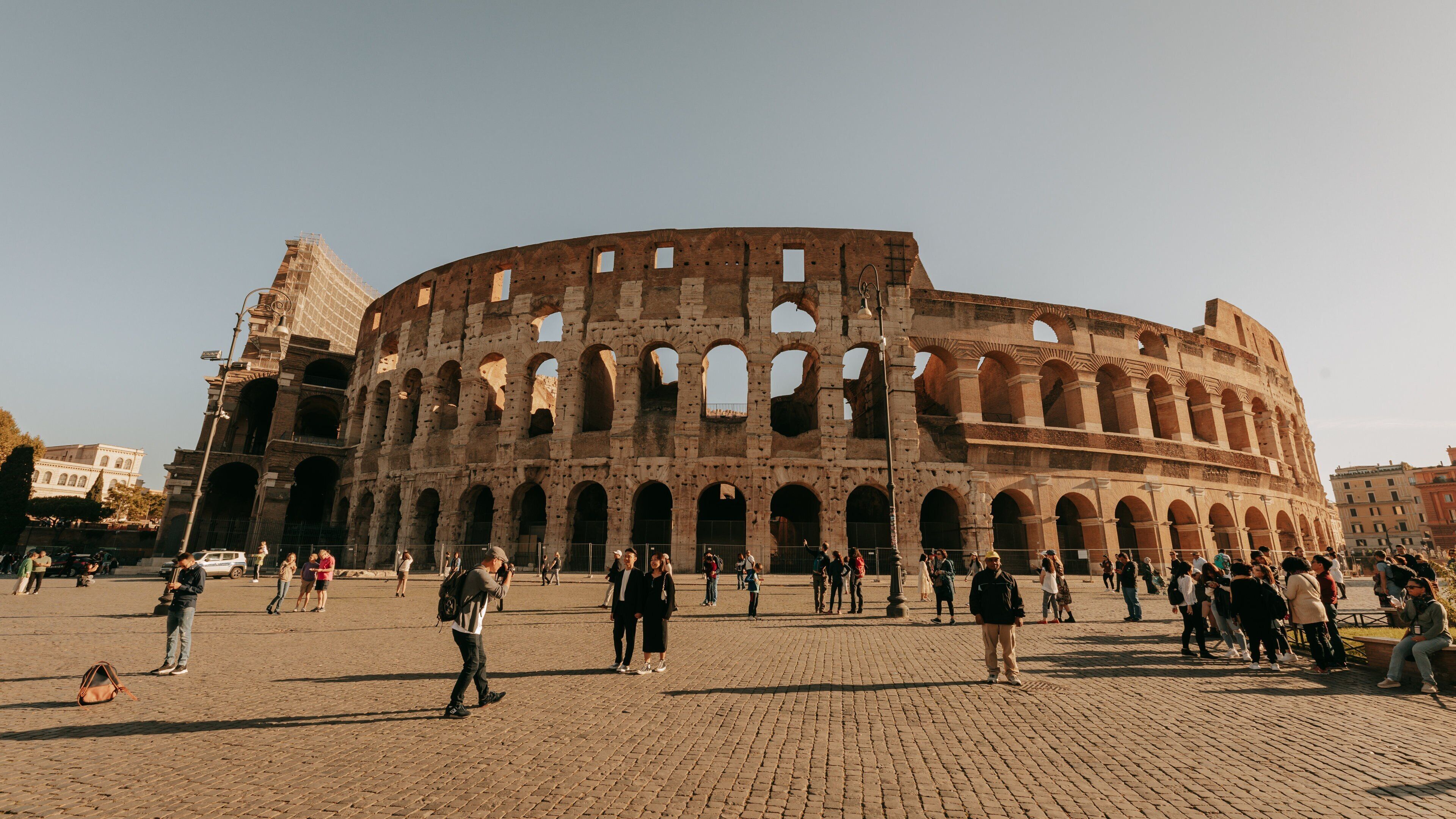 Colosseum featuring a sunset, a monument and heritage architecture