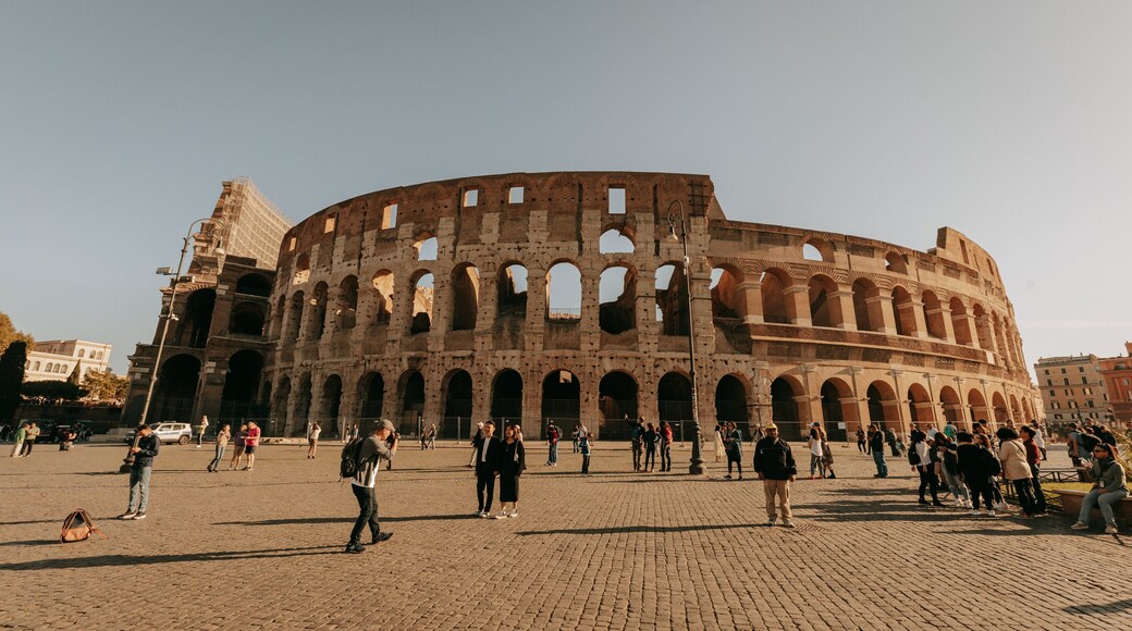 Colosseum featuring a sunset, a monument and heritage architecture