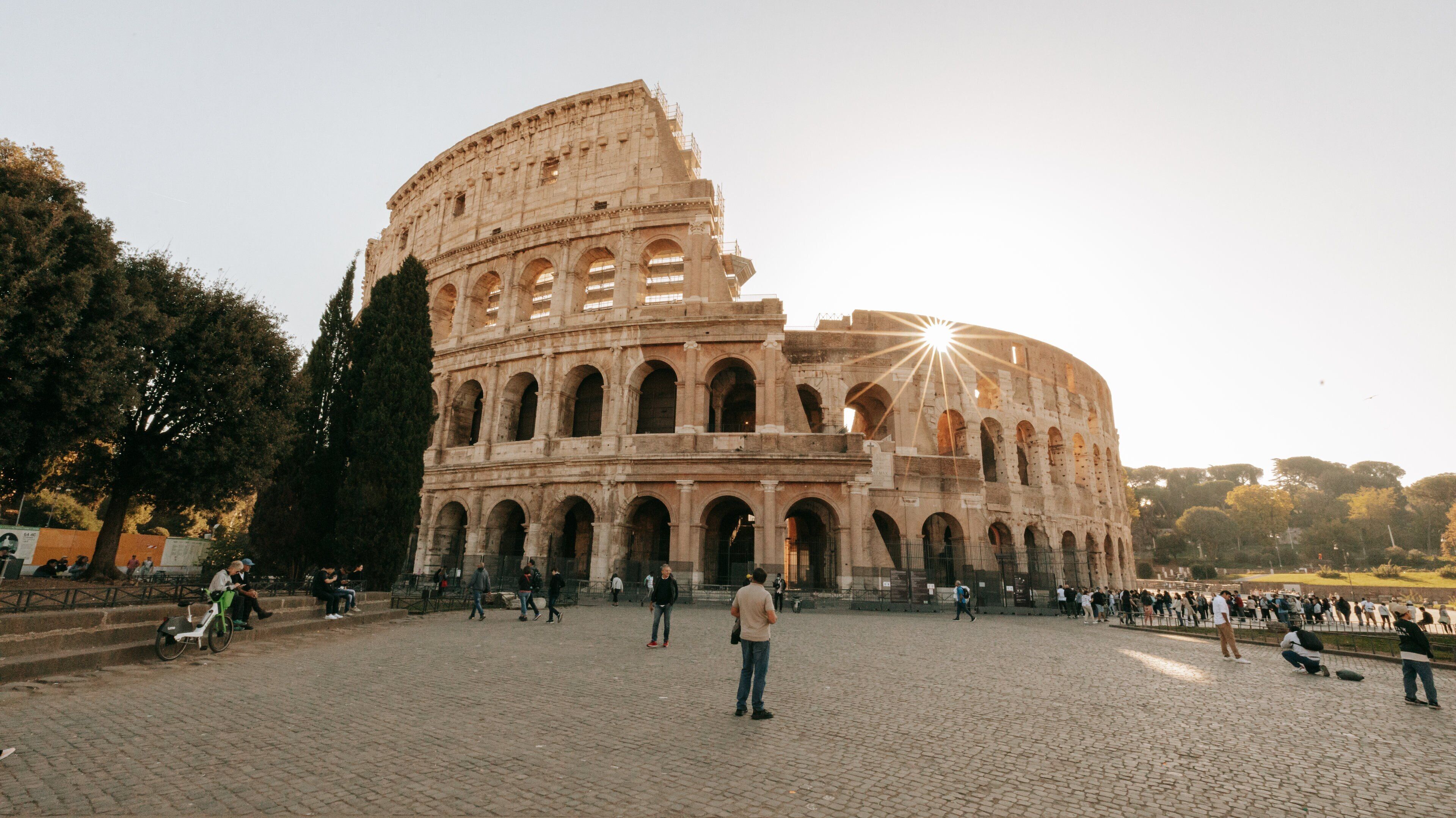 Colosseum featuring a sunset, heritage architecture and a monument