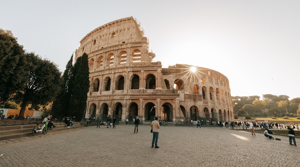 Colosseum featuring a sunset, heritage architecture and a monument