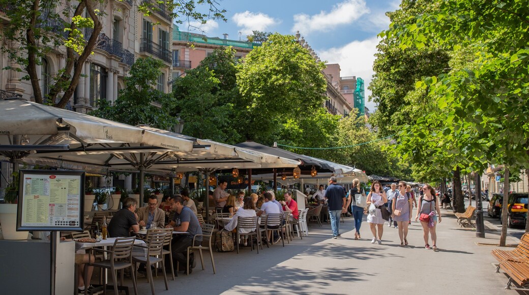 Eixample showing street scenes and outdoor eating as well as a small group of people