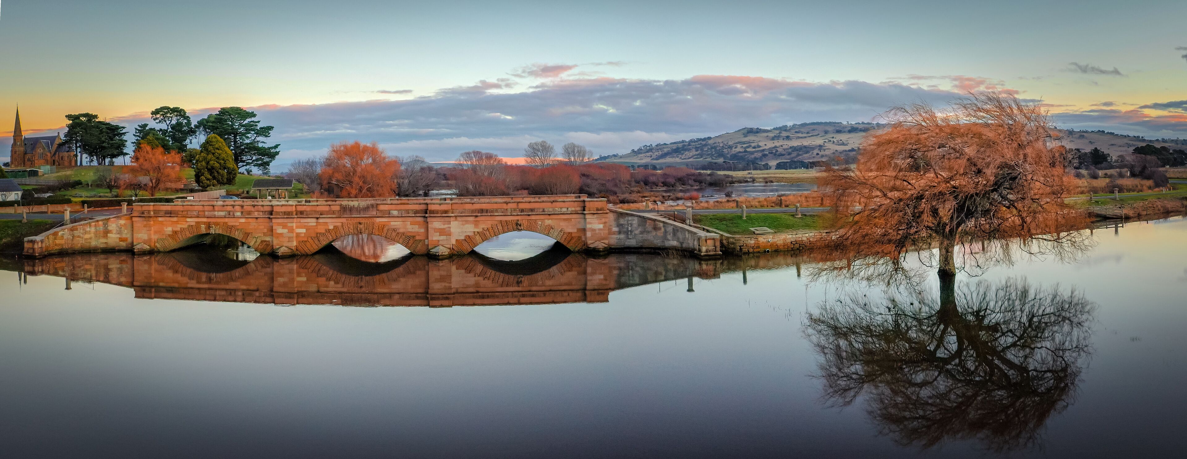 Scenic view of a bridge on sunset background in Ross, Tasmania, Australia