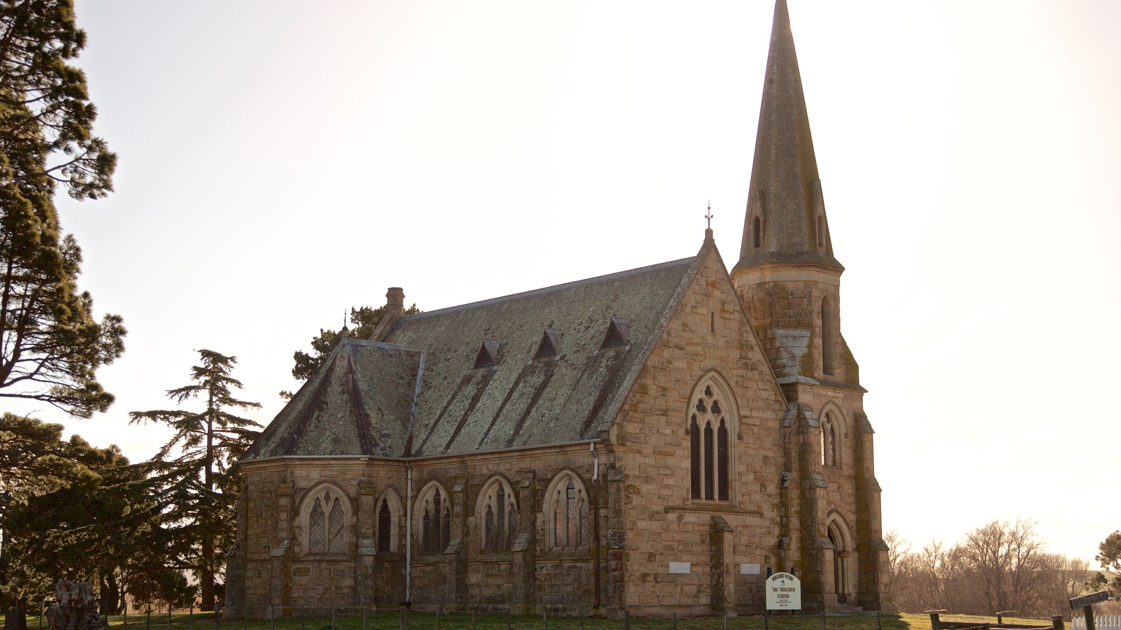Ross showing a church or cathedral, heritage architecture and a sunset