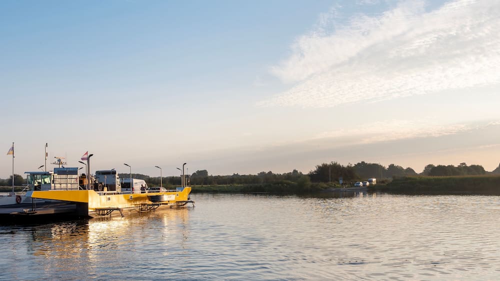ferry between afferden and boxmeer on river maas in limburg