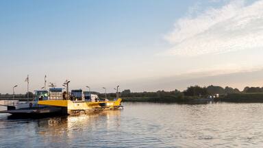 ferry between afferden and boxmeer on river maas in limburg