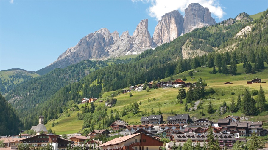 Fassa Valley which includes forests, mountains and landscape views