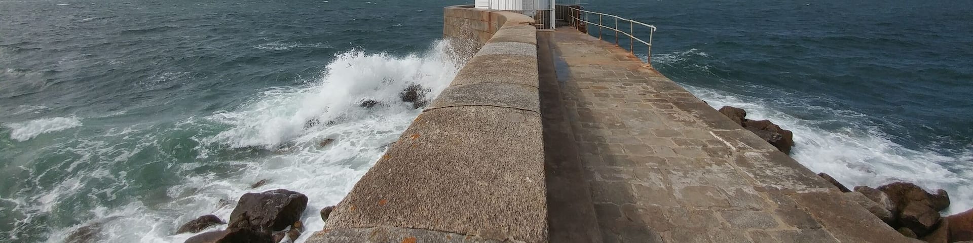 Nice walk along the wall with lighthouse at the end. It's going quite far away from the land and it can be rather windy on the end.