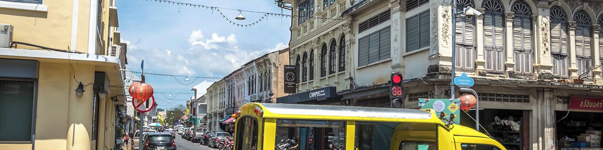 A bright yellow tuk-tuk heads north on Yaowarat Road through Old Phuket Town. Tuk-tuks offer a convenient way to get around Phuket Town or any other resort town in Phuket yet, their rates are often over the top. Always bargain the fee of your course before to get in, if you wanna avoid bad surprises... #LifeAtExpediaGroup