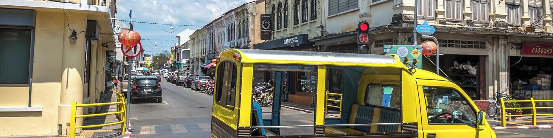A bright yellow tuk-tuk heads north on Yaowarat Road through Old Phuket Town. Tuk-tuks offer a convenient way to get around Phuket Town or any other resort town in Phuket yet, their rates are often over the top. Always bargain the fee of your course before to get in, if you wanna avoid bad surprises... #LifeAtExpediaGroup