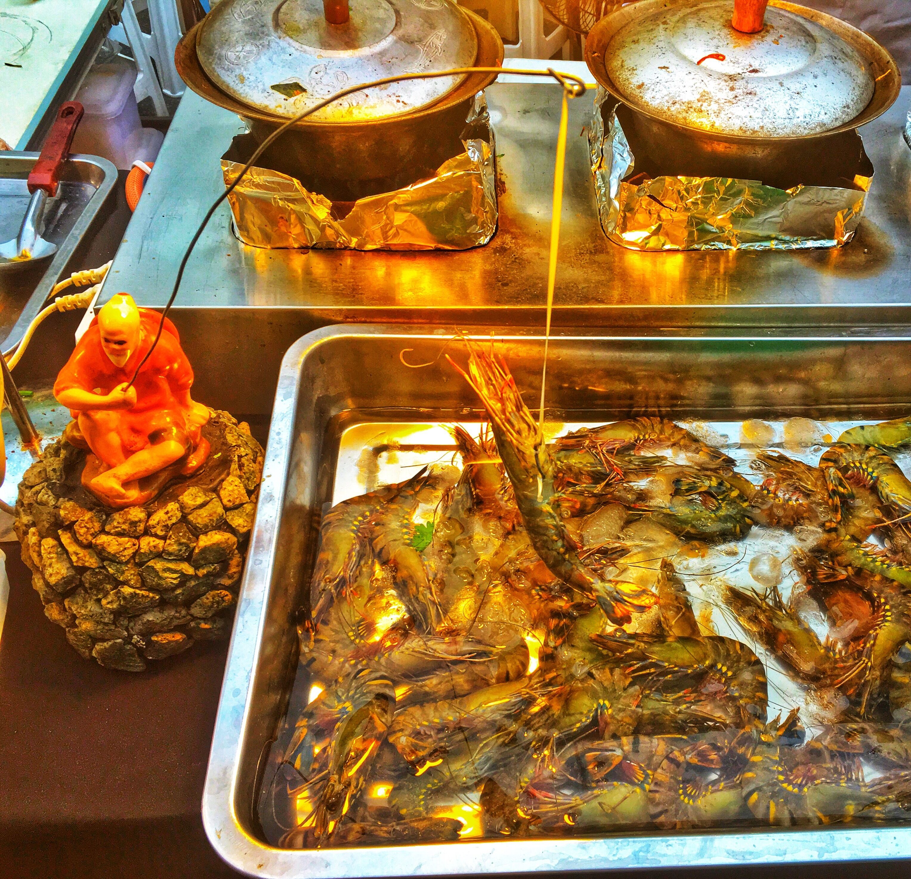 Smart way to attract hungry locals & tourists in weekend market (Naka Market) in #Phuket old town. The crowded weekend market is the largest in the island, with many family businesses offering all the exotic food you can think of. #Thailand #LifeatExpedia #LikeALocal #Trovember