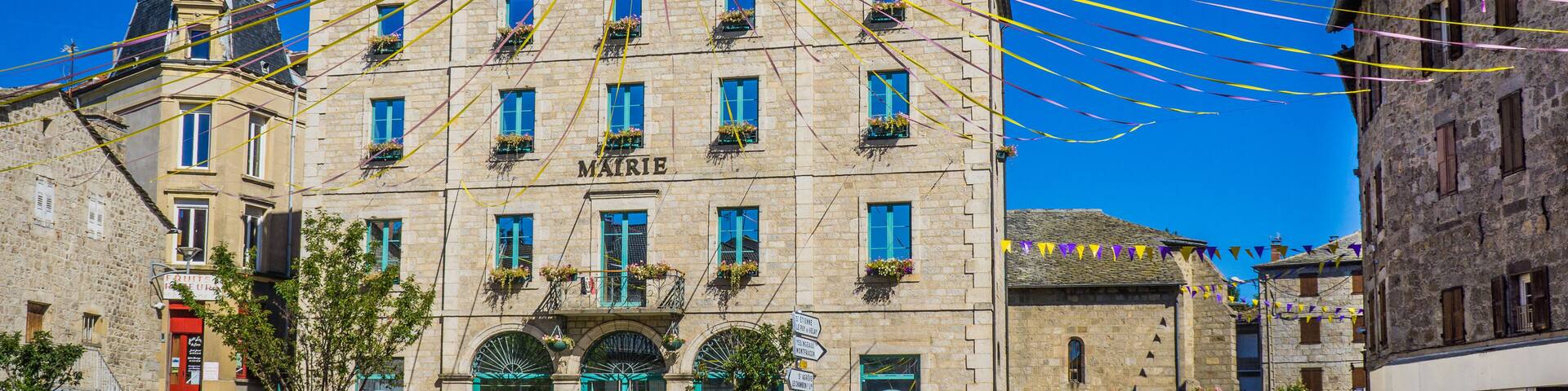 The main square of Tence (place de l'Hôtel de ville), a small town in Auvergne, France
