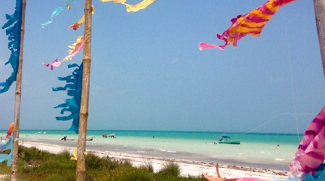 Flags fluttering on the beach on Isla Holbox.