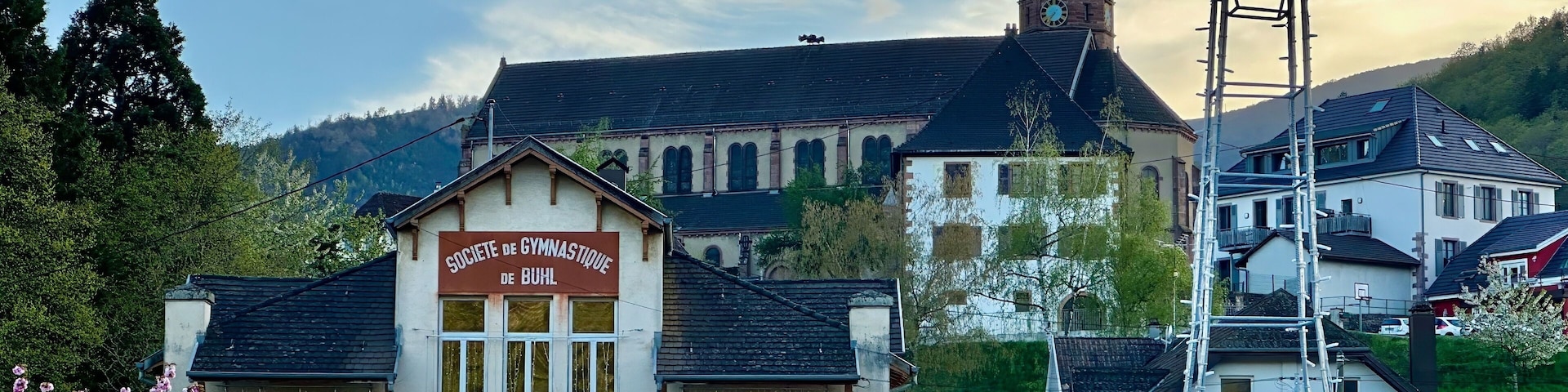 Quaint Buhl Village with Gymnastics Society Building and Eiffel Tower Sculpture, Alsace, France