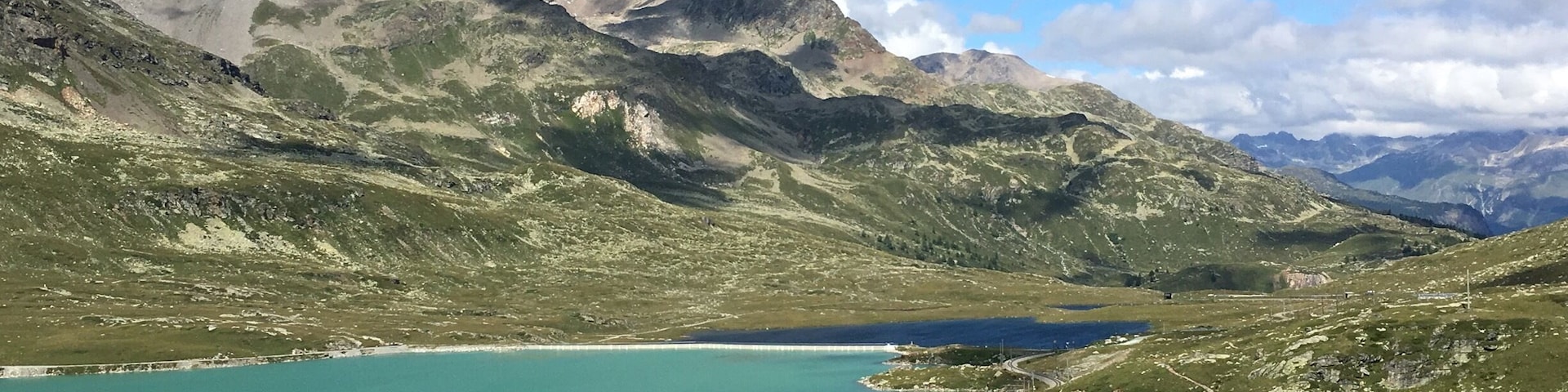 Driving from St. Moritz to Livigno: white lake and black lake