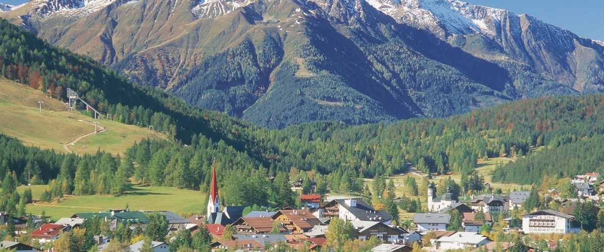 Seefeld in Tirol featuring mountains, a small town or village and forest scenes