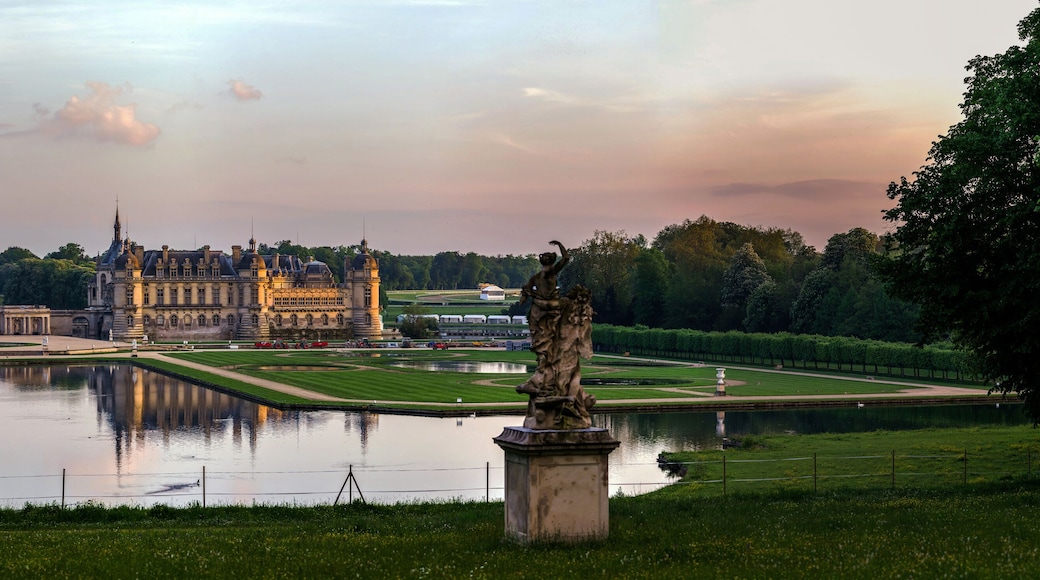 Chantilly castle panoramic view on sunset background