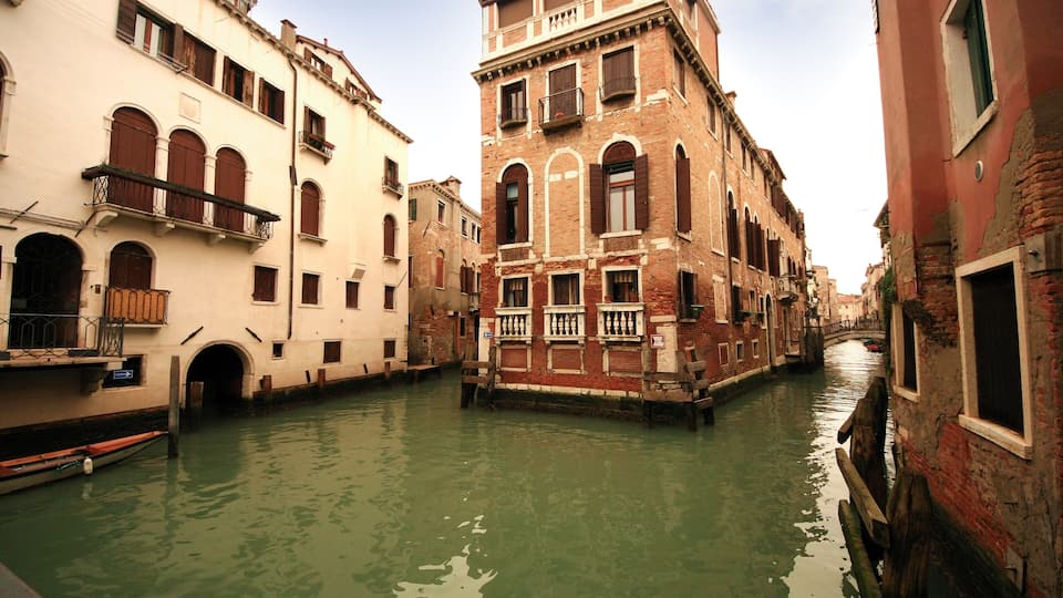 Old canals and Rialto bridge in Venice