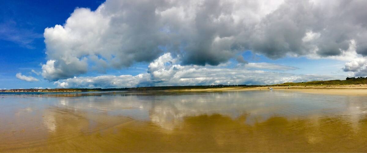 I liked the reflection of the clouds on the wet sand at low tide.