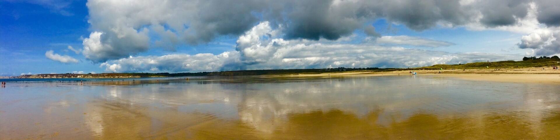 I liked the reflection of the clouds on the wet sand at low tide.