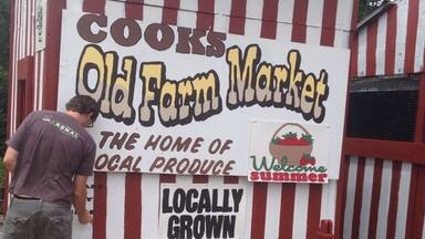 Cooks Local Produce stand. Picked fresh everyday. Paying is on the long lost honor system. Slide your cash into a slot when you are done. Amazing to taste fresh picked fruits & veggies.