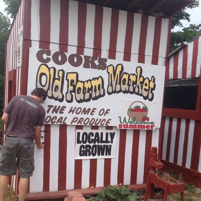 Cooks Local Produce stand. Picked fresh everyday. Paying is on the long lost honor system. Slide your cash into a slot when you are done. Amazing to taste fresh picked fruits & veggies.