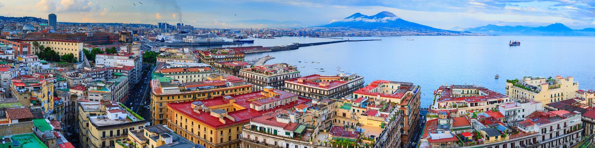 Panoramic seascape of Naples, view of the port in the Gulf of Naples, Torre del Greco, and Mount Vesuvius. The province of Campania. Italy.