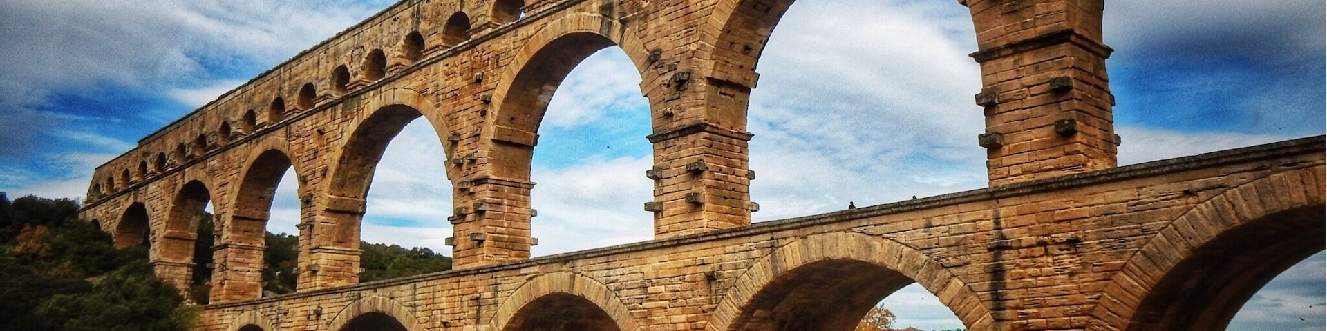 The Pont du Gard is very early Roman Aqueduct which crosses the River Gardon in Southern France.
It was built as part of a fifty kilometre system to carry water from the fresh water springs in Uzes to the thriving city of Nimes. Considering that it was built between 40-60 AD the system and the bridge was a colossal undertaking and nothing short of an engineering marvel.
There is a very informative museum onsite which allows you to understand the importance of water to the Romans and how the bridge was constructed.
#bestof5