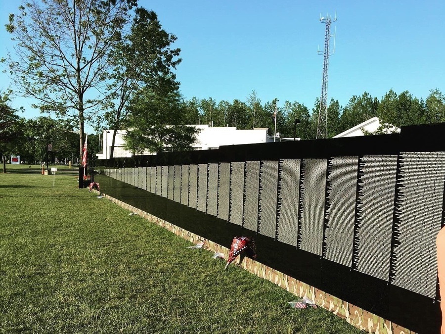 Visited the Moving Wall in display here in Pelham. Im glad I went. I grew up in this era and was lucky to not lose any loved ones, but did know a few who came back haunted or broken. What touched me the most were the places where people had left behind flowers or flags in the places where their loved ones were listed. Thank you for your service to all service people living and dead.