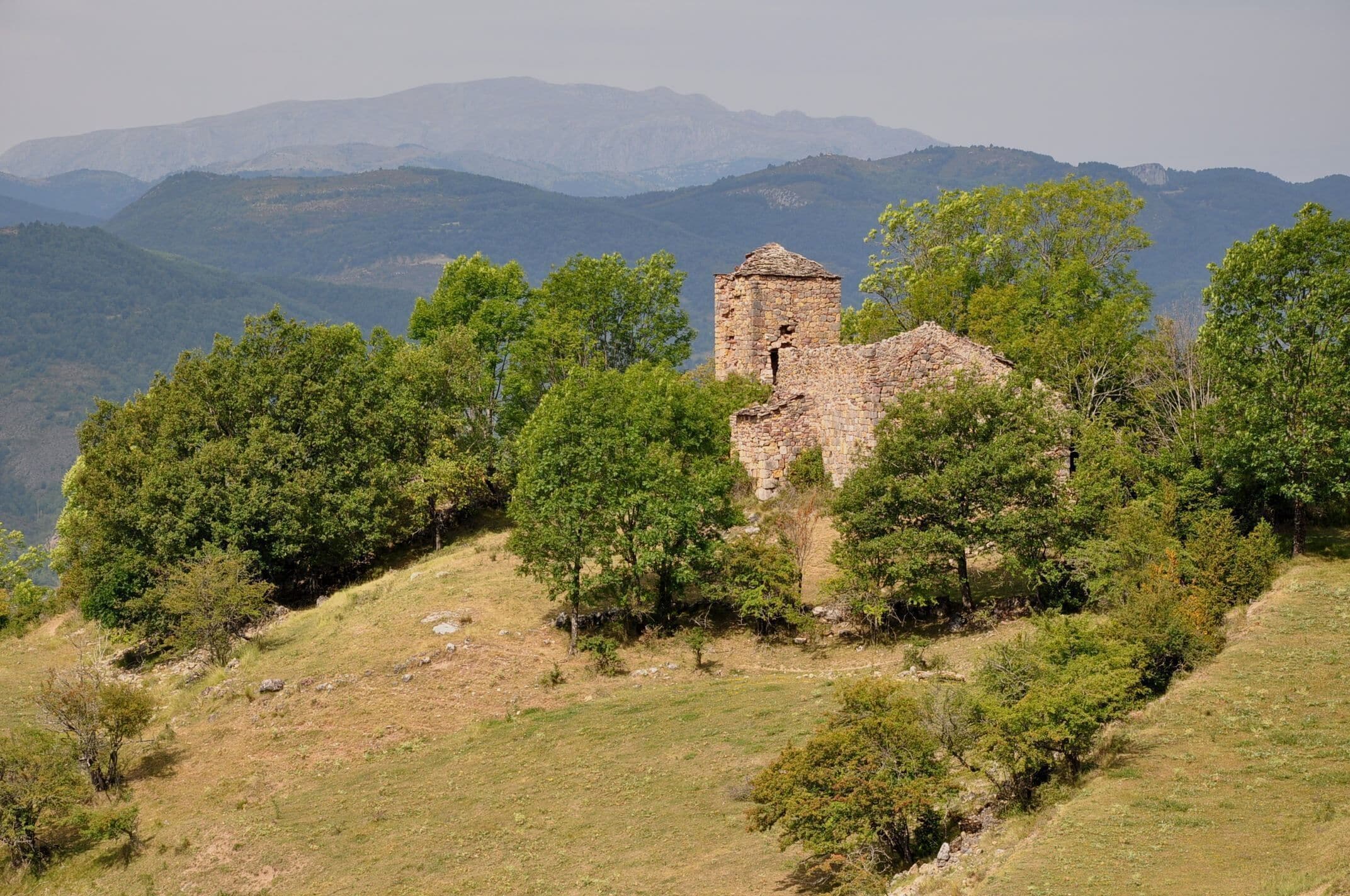 The ruined church of Santa Maria in Sarroqueta in the Pyrenees (Municipality El Pont de Suert, Alta Ribagorça district, Catalonia, northern Spain). Probably from the 13th century.