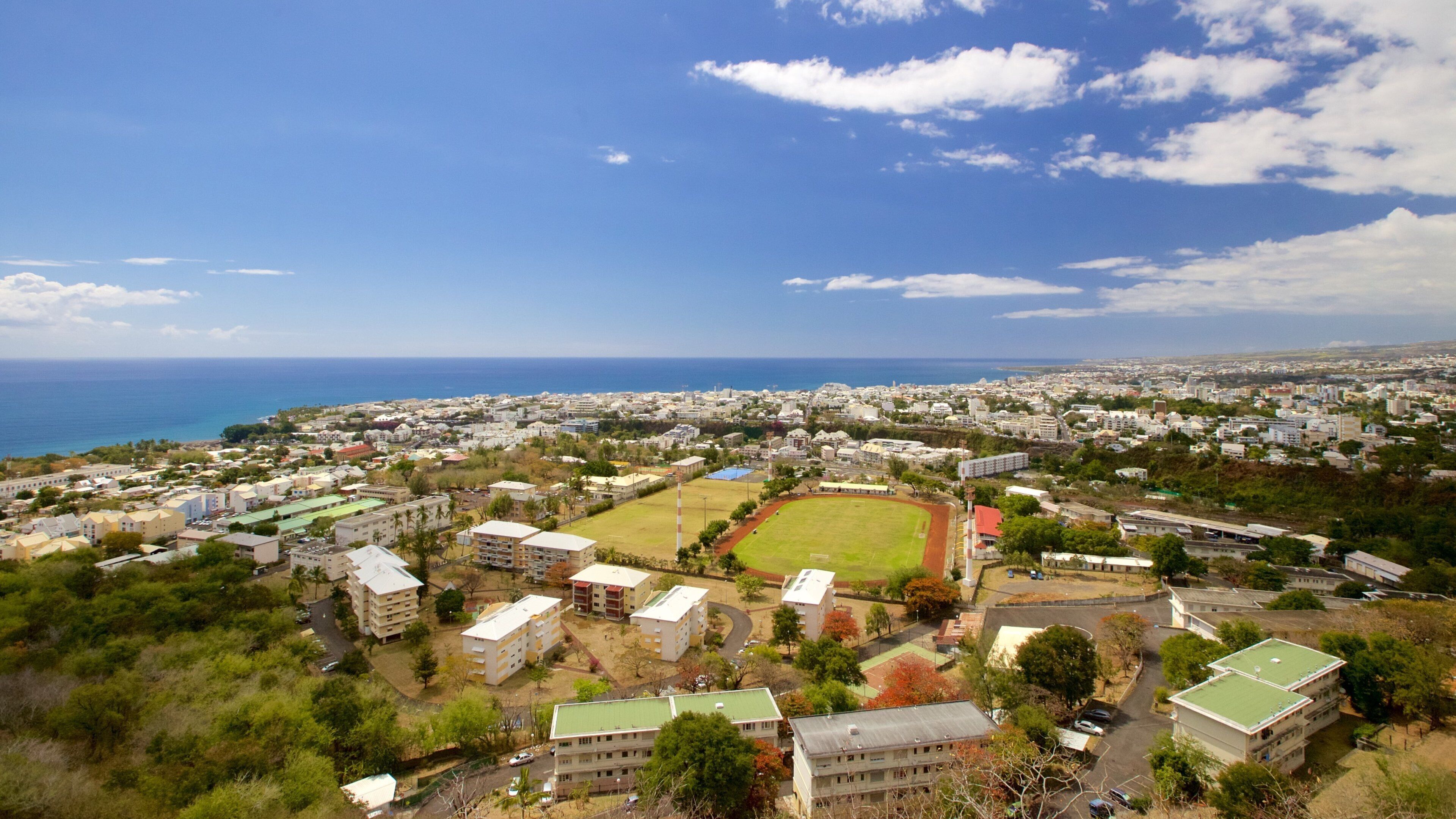 Saint-Denis which includes a city and general coastal views