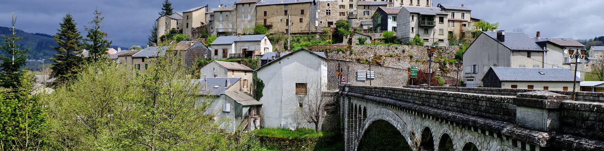 Bridge over the Agout river, leading to the perched village of La Salvetat-sur-Agout.