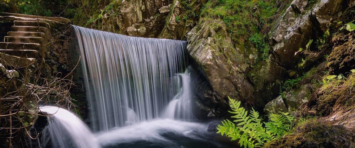 Lousã is in the center of Portugal. This picture was taken in a small river next to the Castle of Lousã. Gorgeous forests and delicious food. Excellent place to visit on your way to Coimbra.