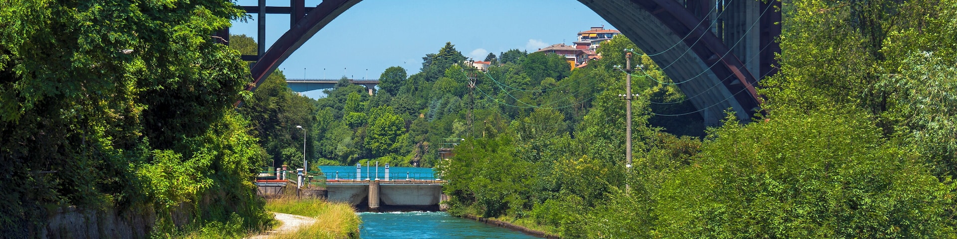 The A4 bridge over the Adda River, with the Naviglio Martesana in the foreground, seen from the Trezzo side of the river.