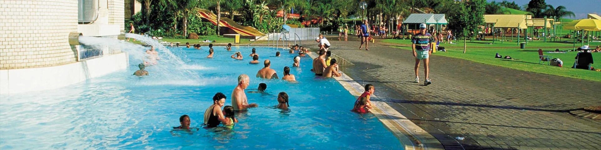 Bela-Bela showing swimming, a pond and a pool