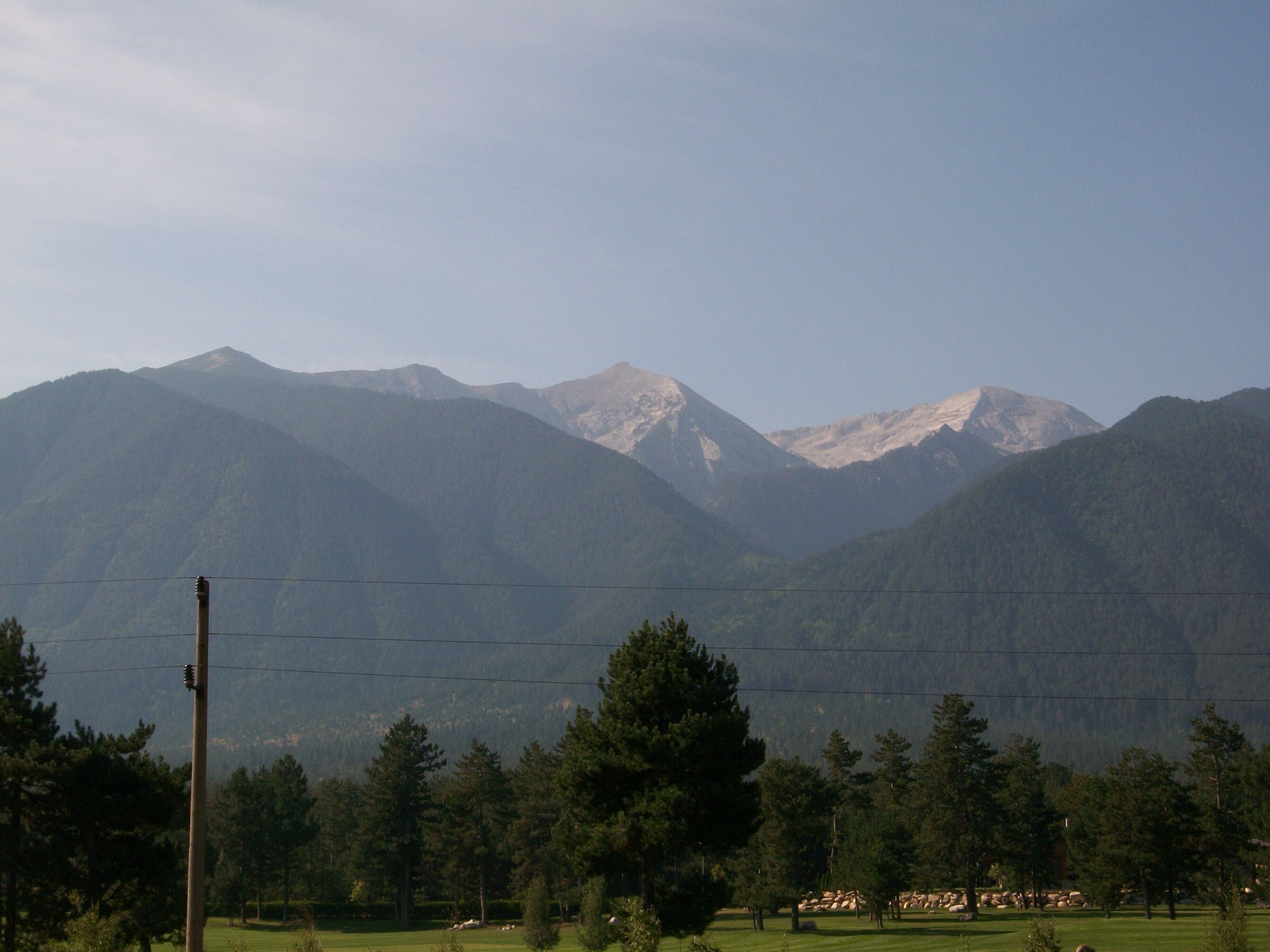 The mountains around Bansko, Bulgaria.  I suspect that they look spectacular in the winter with all the snow.  It is a very popular place for winter sports.  A friend recommends it highly