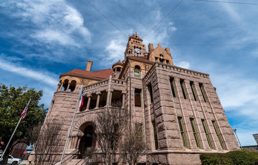 Wise County, TX Courthouse with blue sky in background