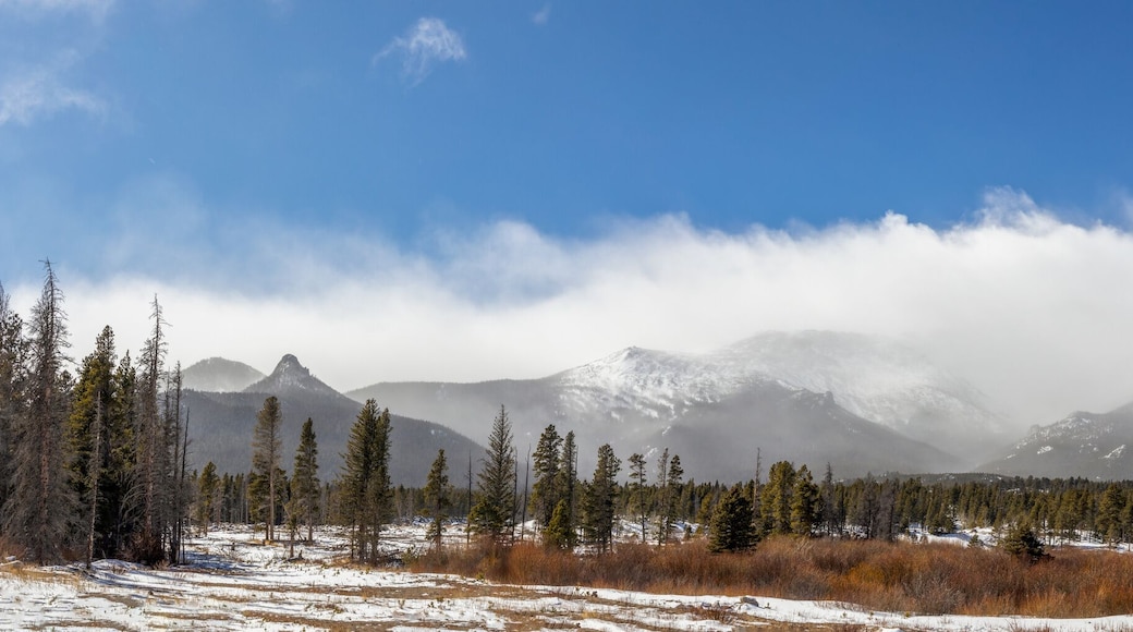 Panoramic view of the mountain range and Saint Catherine's Chapel on the Rock. Church in the Rocky Mountains. Allenspark, Colorado.