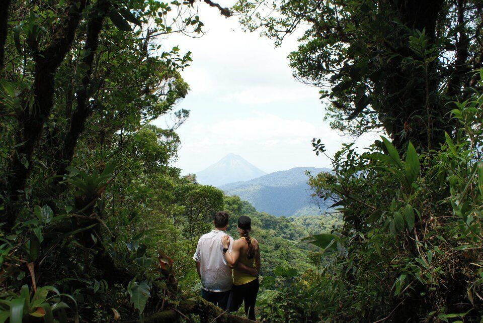 Volcano viewing while hiking in the jungle in Sanata Elena Reserve in Monteverde, Costa Rica. The volcano in the background is Arenal Volcano which has the town of La Fortuna located around its base. #hiking 